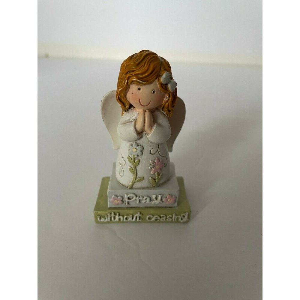 Little Ceramic Angel Girl, Standing on books with